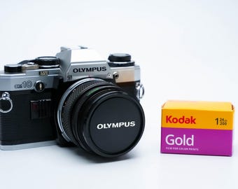 Olympus OM-10 + Olympus G.zuiko 50mm F/1.4 Lens + Free Kodak Gold
