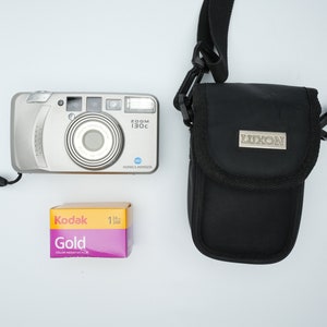 Konica Minolta Zoom 130c – 35mm Point-and-Shoot Film Camera with Case + Kodak Gold Film (Tested & Ready)