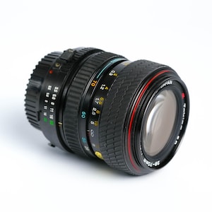 Tokina 28-70mm f/3.5-4.5 – Versatile Vintage Zoom Lens for Minolta MD