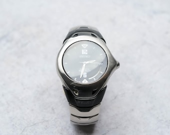 Seiko 5J22-0A70 – Innovative Kinetic Auto Relay Watch with Futuristic Design