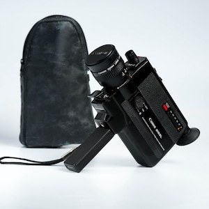 Canon 310XL Super 8 Camera with f/1.0 8.5–25.5mm Lens + Leather Case – Fully Working XL Low-Light Model (1970s Japan)