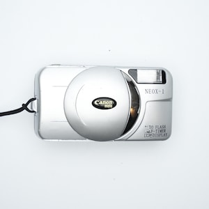 Kompaktowy aparat typu „wyceluj i zrób zdjęcie” Canon Mate Neox-1 – ponadczasowa prostota w fotografii analogowej