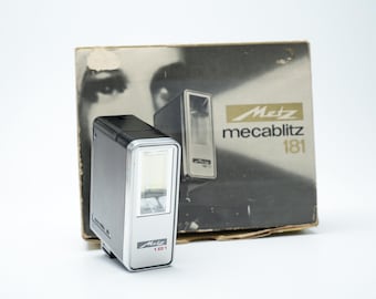 Metz Mecablitz 181 flitser – draagbare cameraflitser – met originele doos – jaren 70 – zwart zilver – werkend