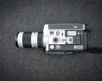 Canon Auto Zoom 1014 Electronic – Super 8 Filmcamera – 1973 – Zilver-Zwart – 10x Zoom – Macro Lens – Voor Cineasten & Verzamelaars