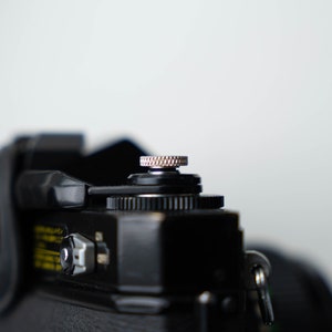 Details van de gelazerde ontspanknop.