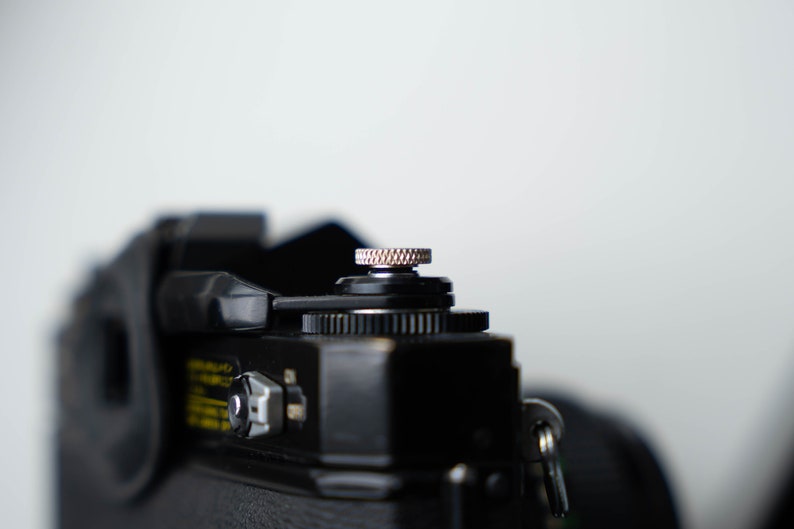 Details van de gelazerde ontspanknop.