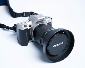Minolta Dynax 505si Super + Cosina 28–105mm f/2.8–3.8 – cámara réflex 35mm AF, probada, lente zoom A-mount
