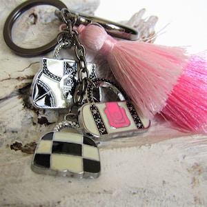 Bag Swag, Keychain, Purse Decoration with Large Red Sand Dollar Glass Pendant, a Brown Tassel and Floral Glass Beads