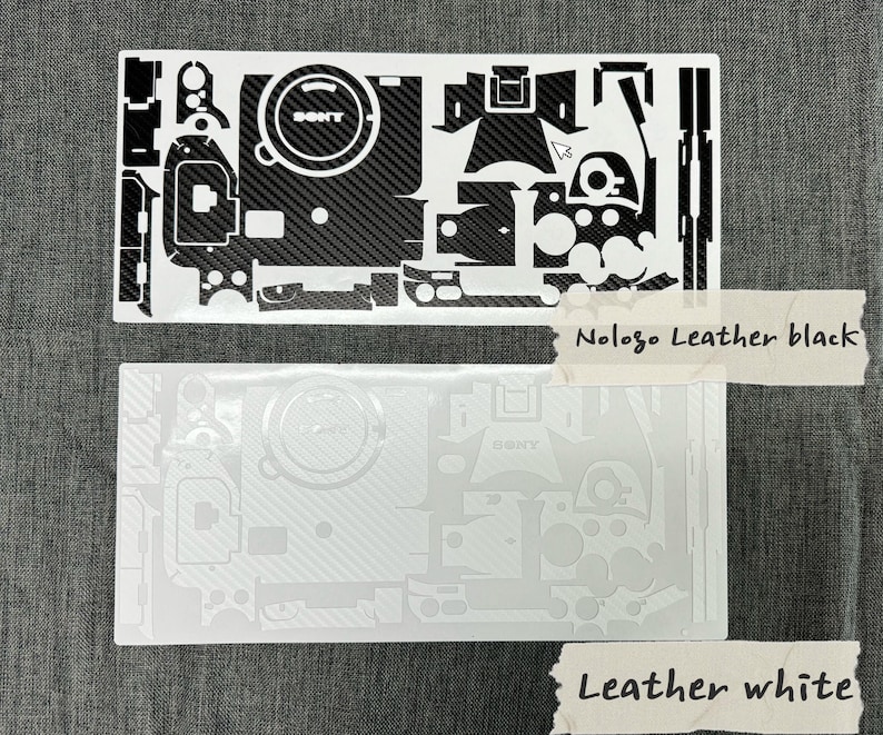 May include: Two camera skin templates, one black and one white, with a carbon fibre pattern. The black template has the text "Nologo Leather black" and the white template has the text "Leather white".