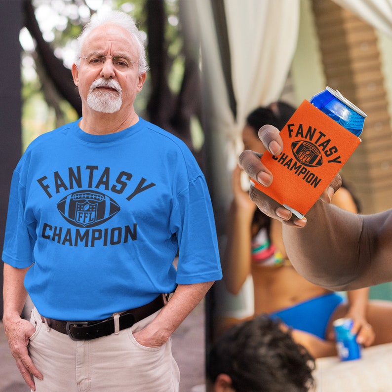May include: A blue t-shirt with the text "Fantasy Champion" and a football graphic. A person is holding an orange can cooler with the same text and graphic.