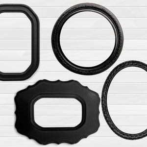 May include: Four black picture frames of different shapes and sizes against a white wood background. The frames are all ornate and have a vintage look.