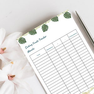 May include: A printable sinking funds tracker with a tropical leaf design. The tracker has columns for funds, beginning balance, and ending balance.