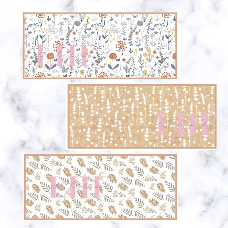 May include: Three rectangular floral patterned designs. The top design has a white background with colorful flowers and the word "III" in pink. The middle design has a tan background with white flowers and the word "III" in pink. The bottom design has a white background with brown and green leaves and the word "III" in pink.