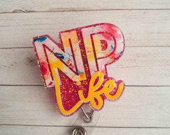 NP Life glitter badge reel