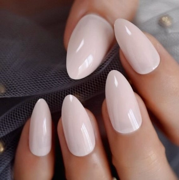 milky pink almond nails
