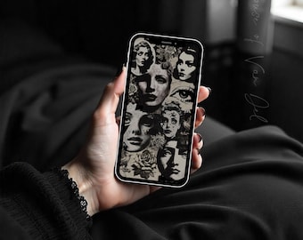 May include: A black smartphone screen showing a collage of monochrome vintage portraits of women's faces, eyes, and roses. The phone is held in a hand with black nail polish. The background is dark.