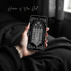 May include: A smartphone displaying a black and white illustration of a ghost in a gothic window. The text "House of Van Del" is visible at the top of the screen.