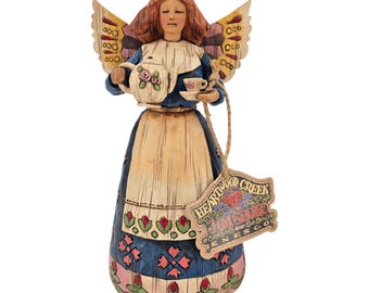 Enesco Jim Shore Heartwood Creek Figurine de nain tenant une tasse à café Blanc et violet