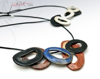 N38 Continents - Ceramic Jewelry, Handmade Pottery Pendant Necklace (Each Necklace)