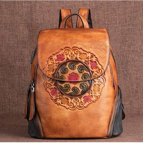 embossed leather backpack purse