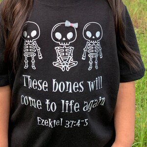 These bones  come to life. Bible scripture tee.