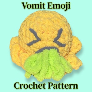 Könnte beinhalten: Häkelanleitung für ein gelbes Kotz-Emoji mit grünem Erbrochenem. Das Emoji hat ein finsteres Gesicht mit grauen Augenbrauen und einem Mund.