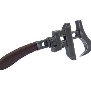 May include: A dark gray adjustable wrench with a brown handle. The wrench has a curved, pointed end and a mechanism to adjust the jaw size. The handle is wrapped in a textured brown material.