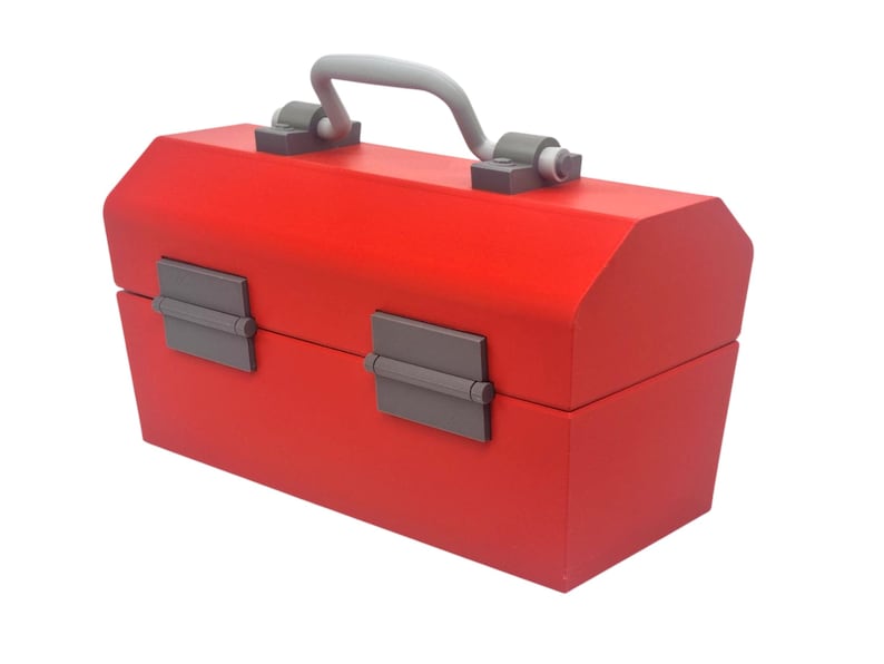 May include: A bright red toolbox with a gray handle and latches. The toolbox is rectangular with an angled top and is designed to carry tools. The handle is arched and the latches are rectangular.