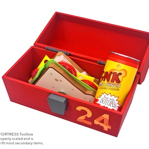May include: A red toolbox with the number 24 on the side, open to reveal a sandwich and a can of "Bonk! Atomic Punch" cherry fission soda. The toolbox is designed to fit most secondary items.