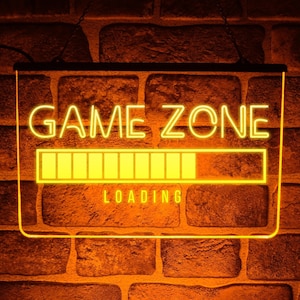 Insegna luminosa a LED Game Zone / Targa da parete in acrilico illuminata e incisa per sala giochi