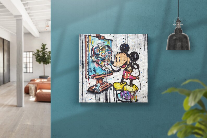 May include: A colorful painting of Mickey Mouse painting a portrait of himself on a canvas. The background is white with splashes of paint.