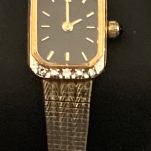 Vintage, Gold Tone,  Citizen Woman’s Watch with Elegant Black Face with Jewels