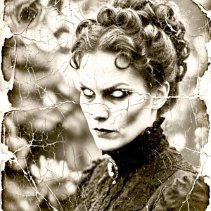 May include: A sepia-toned, distressed photograph featuring a person with pale skin, dark hair styled in an updo, and solid white eyes. The person wears a high-collared black lace garment with a small cameo brooch at the center of the neckline.