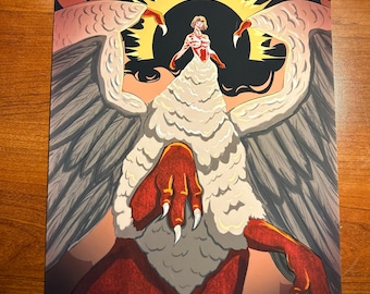 May include: A print featuring a stylized illustration of a figure with wings and a sun-like halo. The artwork uses a palette of red, white, gray, and black. The text "Ghostie Gang Art '24" is visible in the lower left corner.
