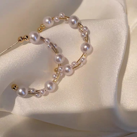 Pearl Hoop earrings, uneven size pearls on the hoop, Trendy and Fashionable Pearl Hoop earrings, elegant hoop.