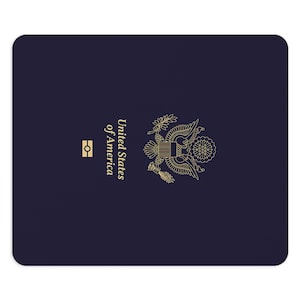 May include: A dark blue United States passport cover featuring the gold-colored Great Seal of the United States, the text United States of America, and the international electronic passport symbol centered on the front cover.