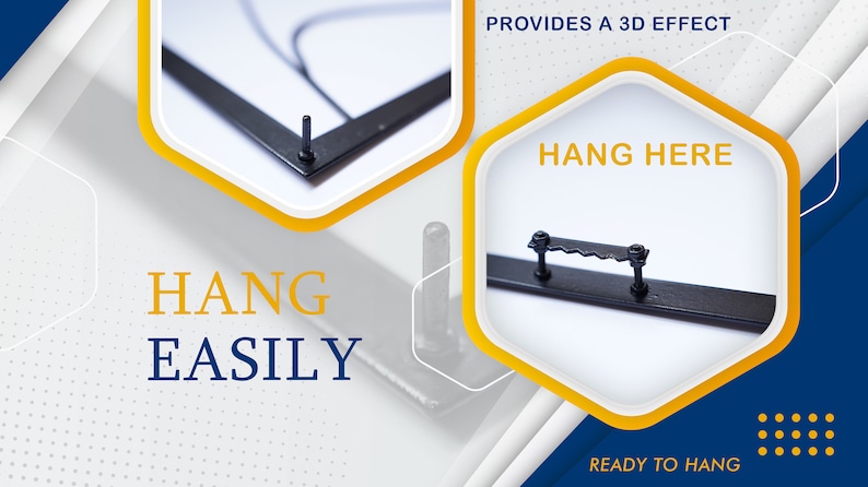 May include: Close-up of a black metal frame with two hanging options. The frame has a small metal hook on the back for hanging on a nail, and a larger metal bar with two screws for hanging on a hook. The text "HANG HERE" and "READY TO HANG" is visible on the image.
