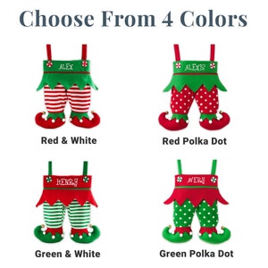 May include: Four Christmas stockings in the shape of elf legs are displayed. Each stocking has a different color scheme: red and white stripes, red polka dots, green and white stripes, and green polka dots. Each stocking is personalized with a name.