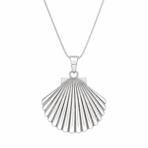 May include: A silver seashell pendant necklace. The pendant is a detailed, three-dimensional scallop shell design. The necklace chain is a delicate silver chain. The pendant hangs from a small loop attached to the shell.