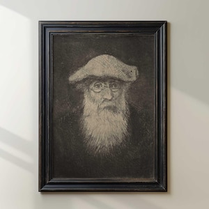Peut inclure: Un portrait encadré en noir et blanc d'une personne âgée avec une longue barbe blanche, des lunettes et un chapeau. L'œuvre est dans un cadre en bois foncé, créant une esthétique classique et intemporelle. Le portrait est une esquisse détaillée.