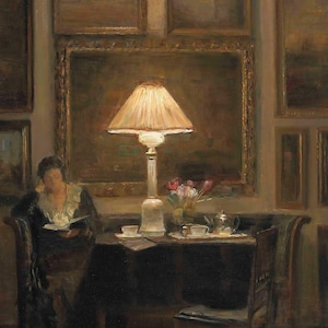 Vintage art print of a cozy interior scene with a glowing lamp, woman reading by a table, surrounded by framed paintings, flowers, and tea cups