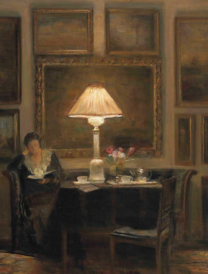 Vintage art print of a cozy interior scene with a glowing lamp, woman reading by a table, surrounded by framed paintings, flowers, and tea cups