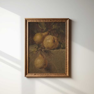 May include: A framed painting depicting a still life with three pears, painted in muted tones of brown and yellow.