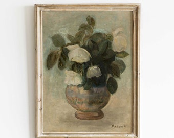May include: An antique-style framed painting of white roses in a vase. The artwork features a muted color palette with shades of green, brown, and cream. The vase is a muted blue-grey with a brown base. The artist's signature, Makowski, is visible in the bottom right corner.