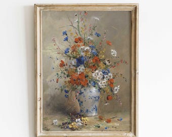 May include: A framed vintage floral still life painting. The artwork features a vibrant bouquet of red, blue, and white flowers in a blue and white patterned vase. The painting has a neutral background and a distressed, light-colored wooden frame.