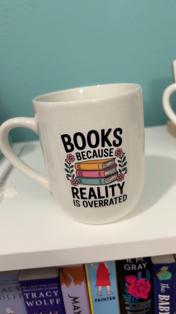 Book Lover Mug: “Books Because Reality is Overrated.”