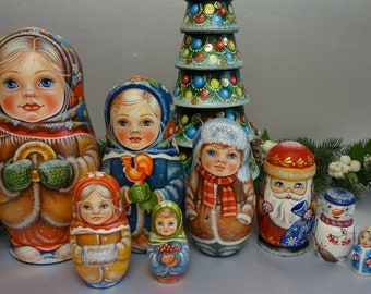 Two original sets of matryoshka dolls: Winter kids 5 seats and Christmas tree 5