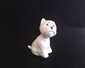 Statuette of a West Highland White terrier, sitting (porcelain)