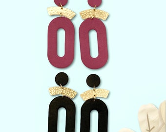 Oval Shape Earrings With Brass Charm