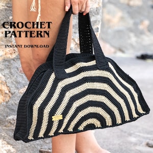 May include: A black and beige crochet tote bag with a striped pattern. The bag has sturdy handles and a small gold tag. The text "CROCHET PATTERN INSTANT DOWNLOAD" is visible in the image.